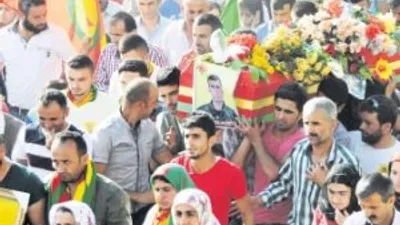 Davutoğlu'ndan YPG cenazelerine şartlı onay
