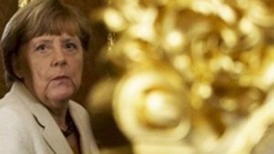 Merkel, altın varaklı koltukları kabul etmedi