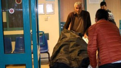 Vahşet ! Karısını keserle öldürdü