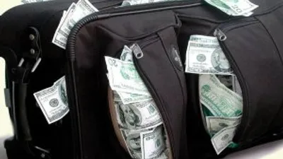 Para dolu valizle yakalandılar