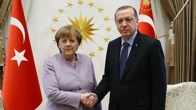 Merkel'den Erdoğan'a Almanya daveti