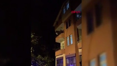 Çatı katından atlayan kadını polis kurtardı