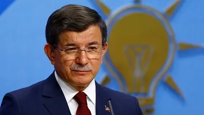 Akit'ten AK Parti'ye Davutoğlu sopası
