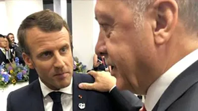 Erdoğan'ın Macron'un omzuna elini atması olay oldu