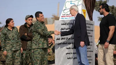ABD PKK'ya silahtan sonra madalya verdi