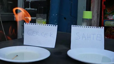 Bakkaldan aldığı kolonya yanmayınca...