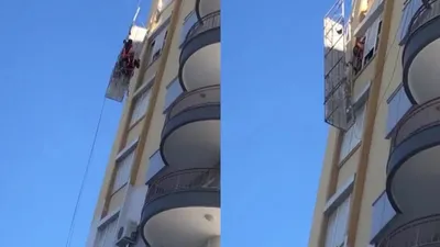 İskelede mahsur kalan işçilerin zor anları kamerada