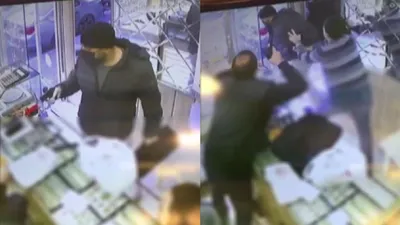 Silahlı soyguncu neye uğradığını şaşırdı!