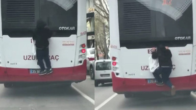Hareket halindeki otobüse tutunarak canını hiçe saydı!