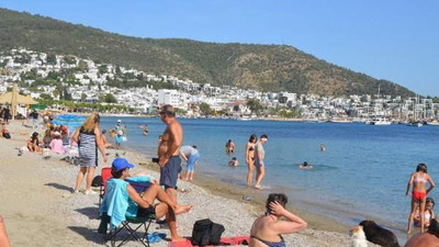 Güneşi gören sahile koştu