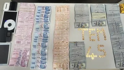 Manisa'da FETÖ operasyonu: Yüklü miktarda para ve altın ele geçirildi