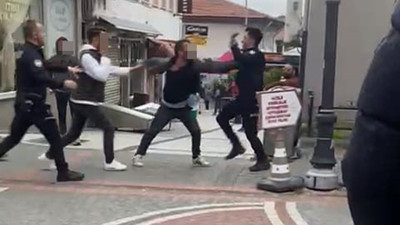 Polise yumruk attı, yine polis kurtardı
