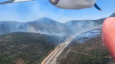 Otomobilde çıkan yangın ormana sıçradı
