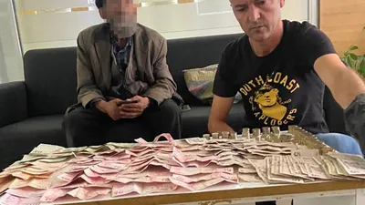 Dilencinin üzerinden tomarla para çıktı