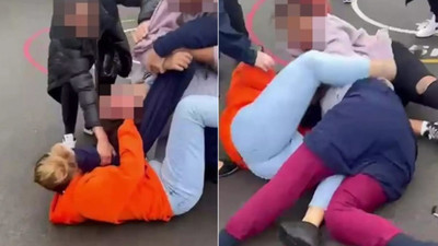 İlkokulun önünde saç saça baş başa veli kavgası