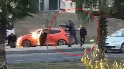 Sokak ortasındaki pompalı tüfekli dehşet kamerada