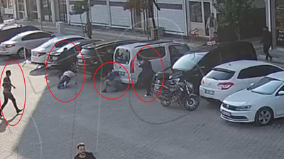 Kocasına sopalarla saldıran gruba silah çekti