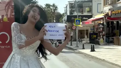 Bodrum'da ilginç anlar: Gelinliğiyle yola çıkıp ''Koca aranıyor, mümkünse zengin'' pankartı açtı