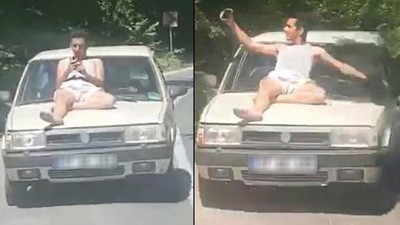 Otomobilin üzerinde tehlikeli yolculuk