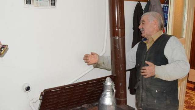 Mucit öğretmen sobadan kombi yaptı