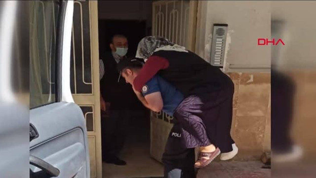 polis ayagi kirilan kadini sirtinda