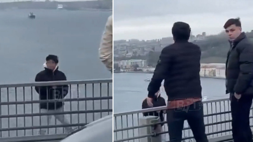 İstanbul'da köprüye çıkarak intihar girişiminde bulunan genci, o sırada köprüden geçen ''Röportaj Adam'' ikna etti.