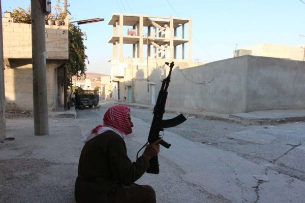 DHA, harabeye dönen Kobani'yi görüntüledi