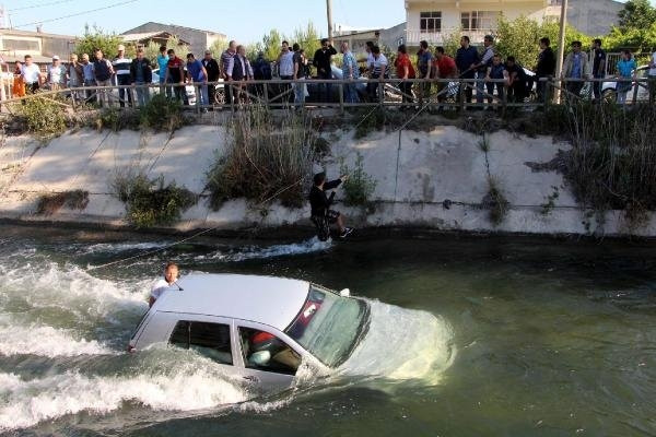 Eşini kurtarmak için hayatını hiçe saydı !