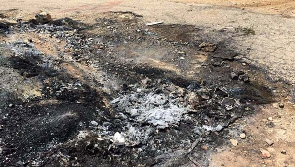 PKK'lılar muhtarı infaz edip ateşe vermiş !