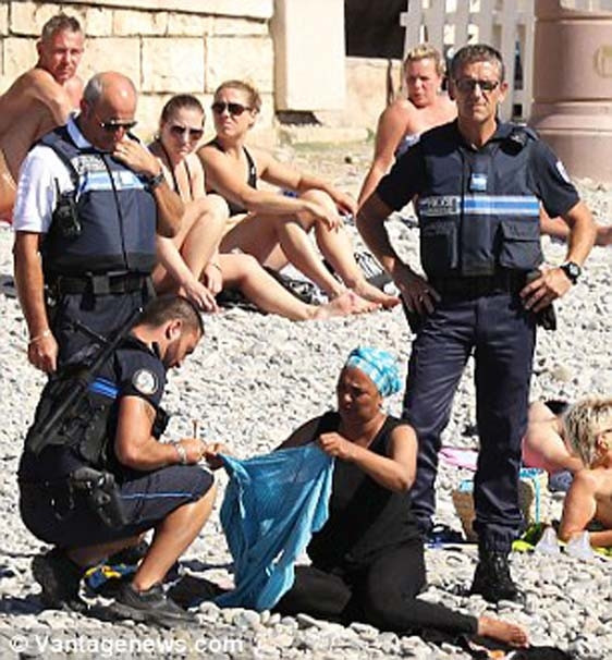 Plajda skandal ! Polis zorla çıkardı...
