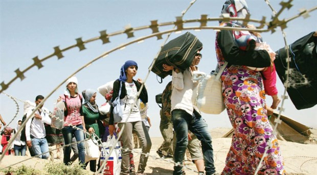 Suriyeli sığınmacılar ''nakit'' yardımlarıyla eve yerleşiyor