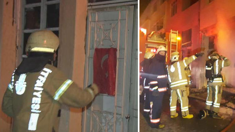 Fatih'te korkutan yangın ! İtfaiyeci Türk bayrağını cebine koydu