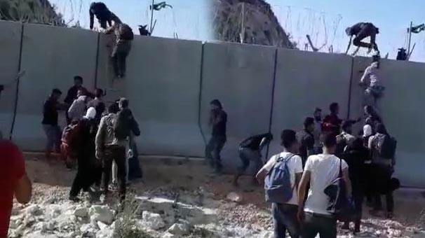 Suriyeliler güvenlik duvarını aşıp Türkiye'ye girdi