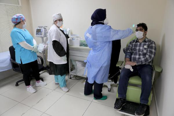 Dünyada bir ilk! İstanbul Tıp Fakültesi'nde ''Covid-19 Hastaları İzlem Merkezi'' açıldı - Resim : 4