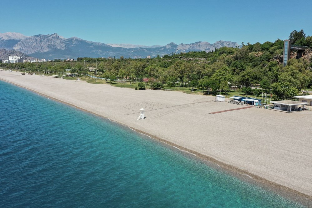 Türkiye'nin tatil cenneti plajında deniz keyfine koronavirüs ayarı - Resim: 2