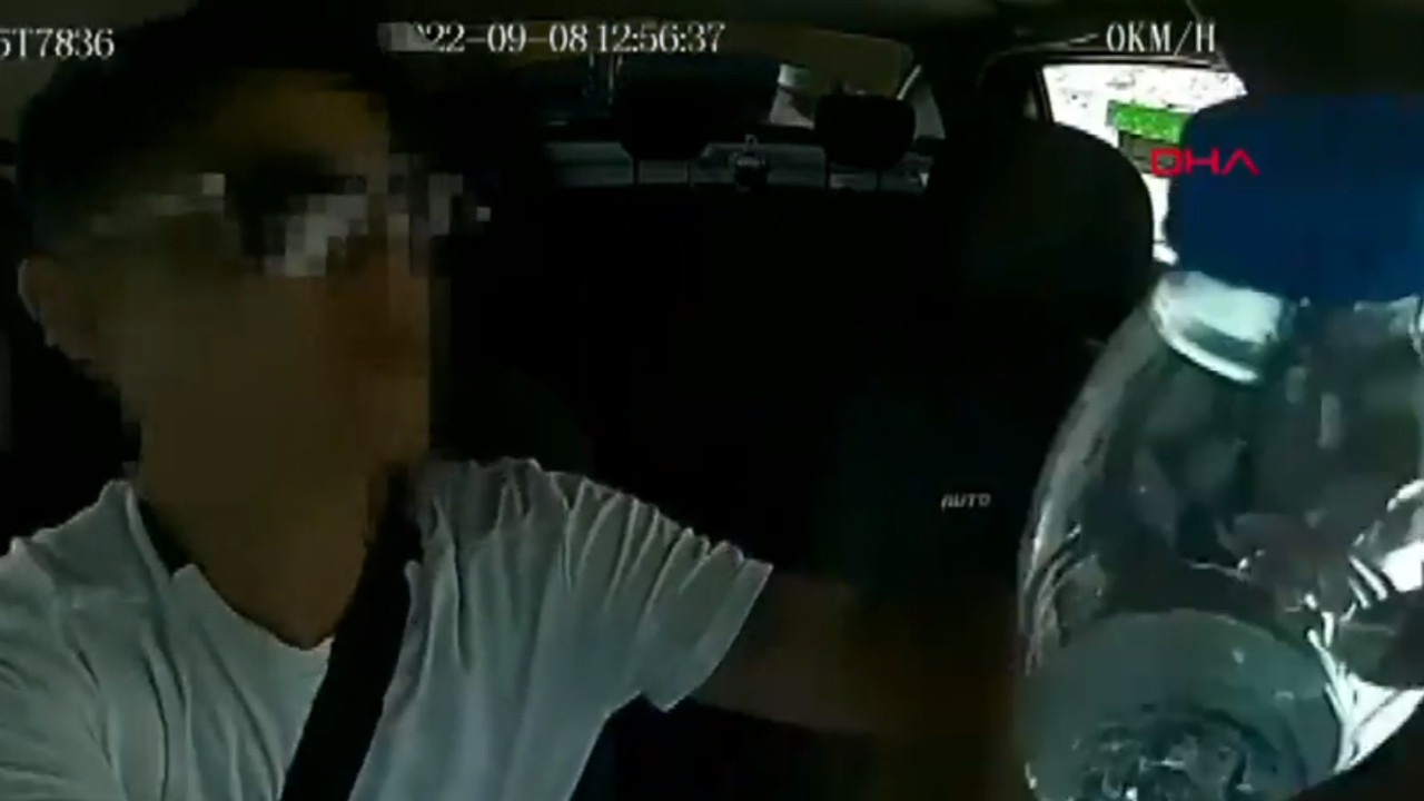 Genç kadının taksiciyi soyduğu anlar kamerada