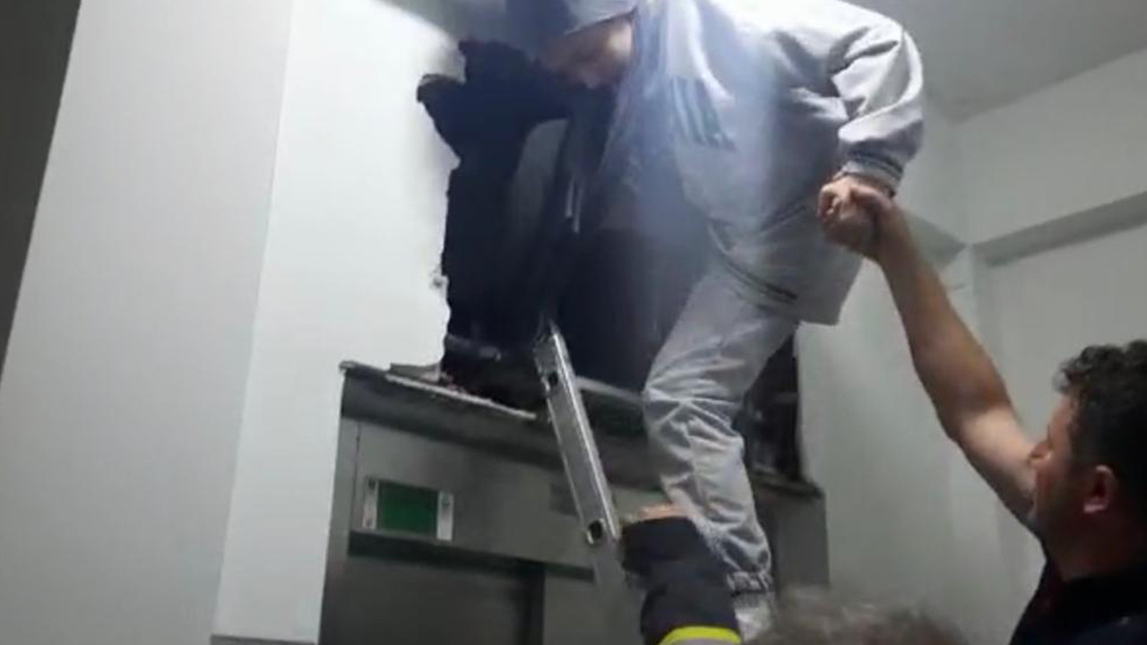Asansörde mahsur kalan 9 kişilik aile duvar kırılarak kurtarıldı