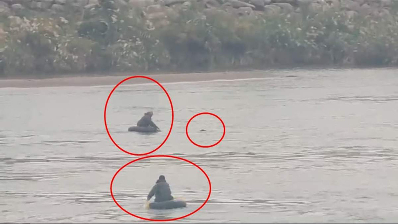 Dicle Nehri'ne atlayan kız kardeşlerden birinin kurtarılma anı kamerada