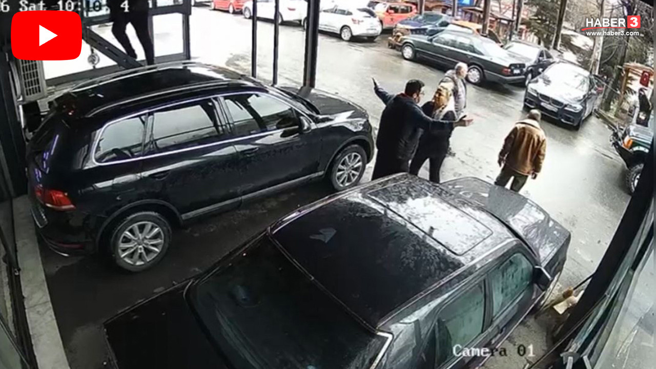 Kocasının eski ortağı silahla iş yerini bastı, eşi kocasına siper oldu