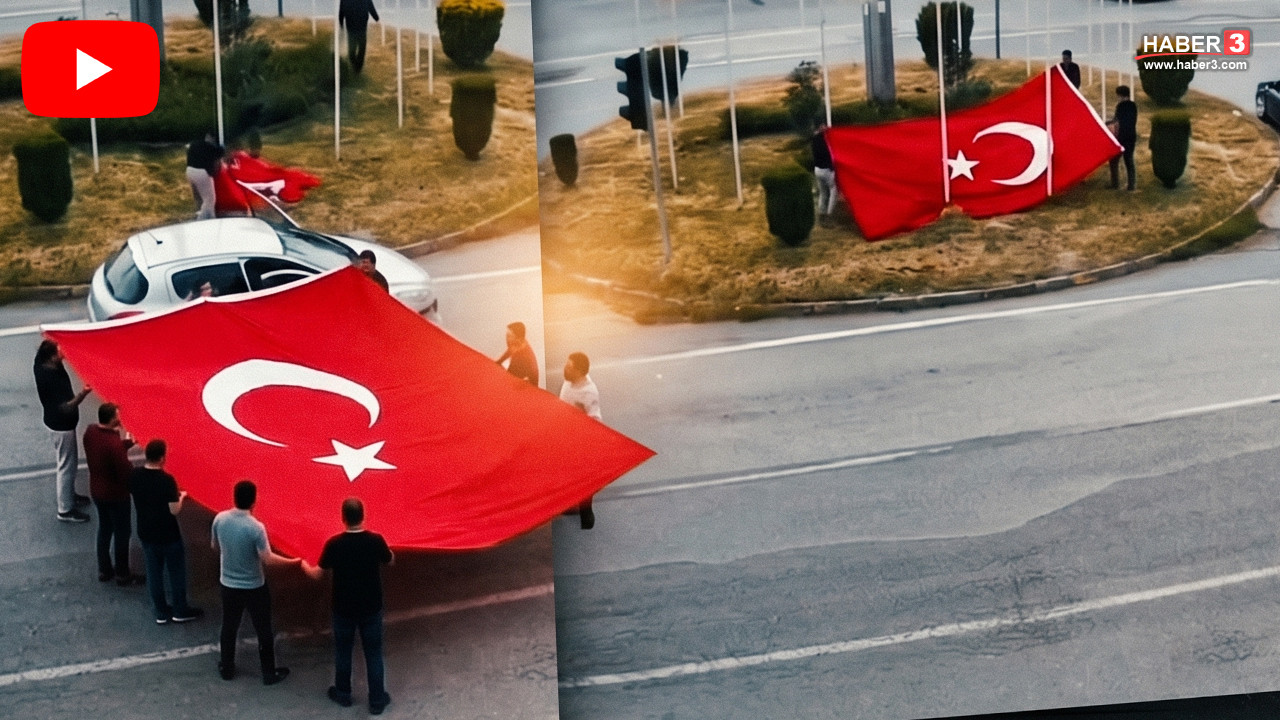 Dörtyol'da yere düşen Türk bayrağını toplayan vatandaşlar